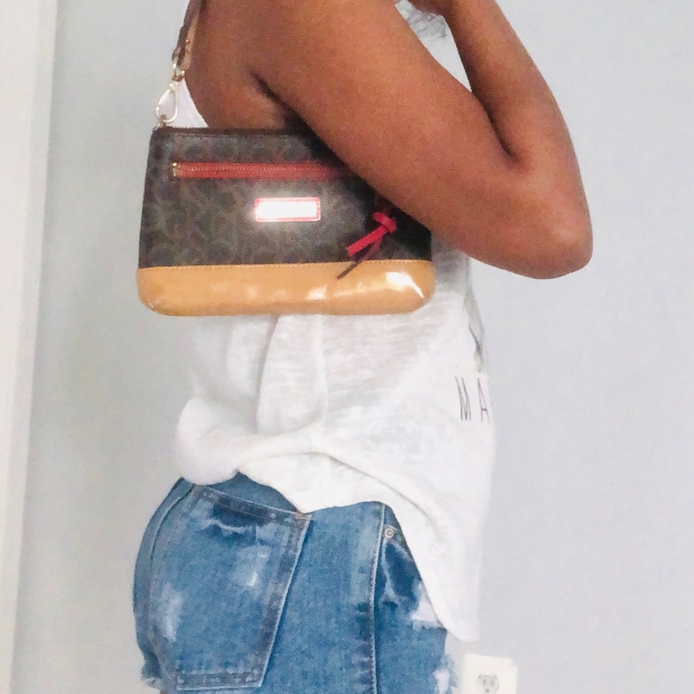 Calvin Klein mini shoulder bag. See all pictures for flaws .